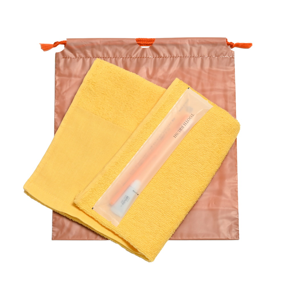 180匁平地付ソフトタオル・国産ハブラシセット（オレンジ）濃色巾着袋入り　200セット