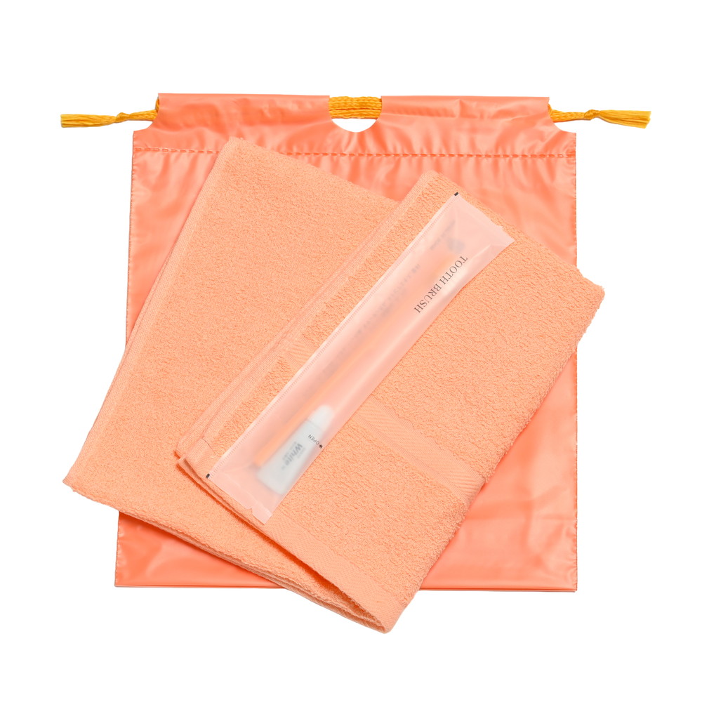 200匁ソフト界切付総パイルタオル・国産ハブラシセット（オレンジ）巾着袋入り　300セット