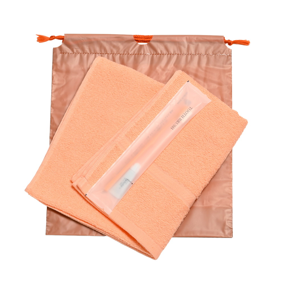 200匁ソフト界切付総パイルタオル・国産ハブラシセット（オレンジ）濃色巾着袋入り　300セット