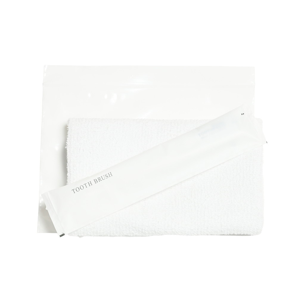 140匁平地付タオル・海外製ハブラシセット（白）白ジッパー袋入り　200セット