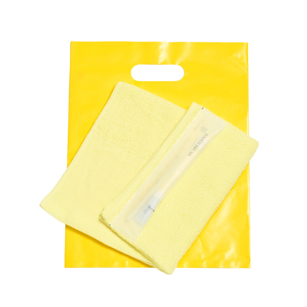 160匁平地付タオル・国産ハブラシセット（イエロー）小判抜きバッグ入り　200セット