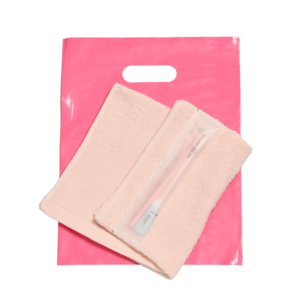 160匁平地付タオル・国産ハブラシセット（ピンク）小判抜きバッグ入り　200セット