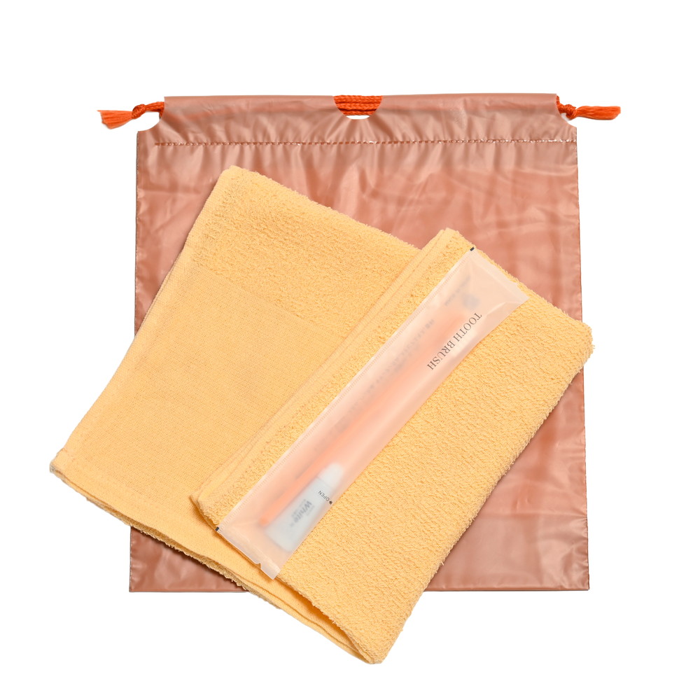 160匁平地付タオル・国産ハブラシセット（オレンジ）濃色巾着袋入り　200セット