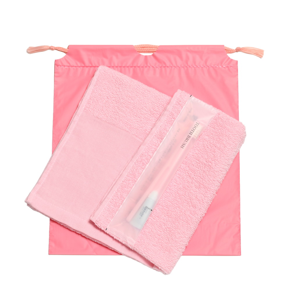 180匁平地付ソフトタオル・国産ハブラシセット（ピンク）巾着袋入り　200セット
