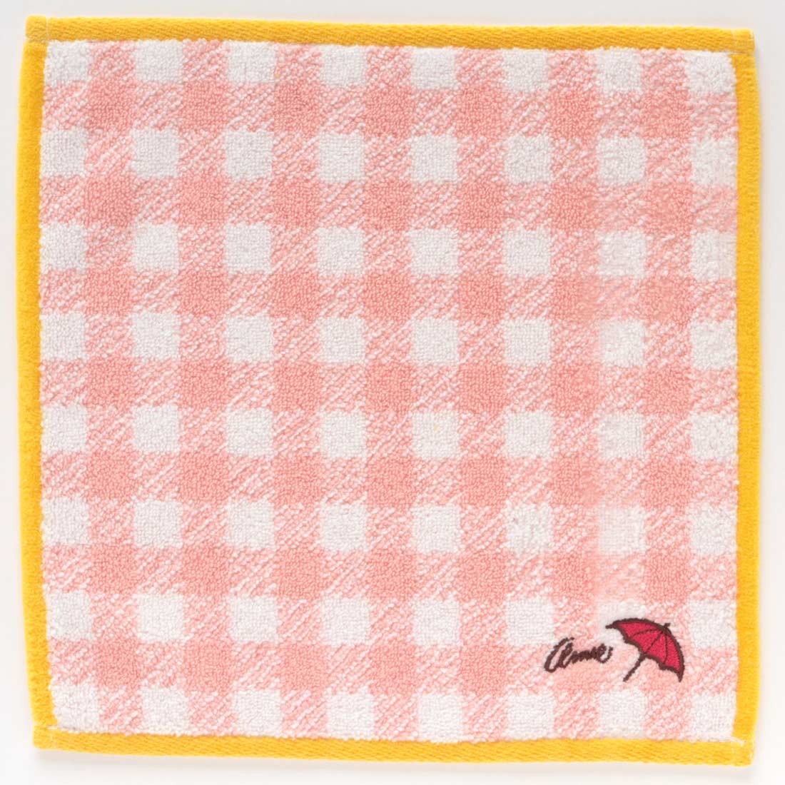 アーノルドパーマータオルハンカチ　シェパードチェック　ピンク