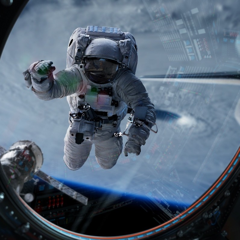 宇宙飛行士が宇宙船の窓から地球を見つめる耐熱繊維コラムのアイキャッチ画像