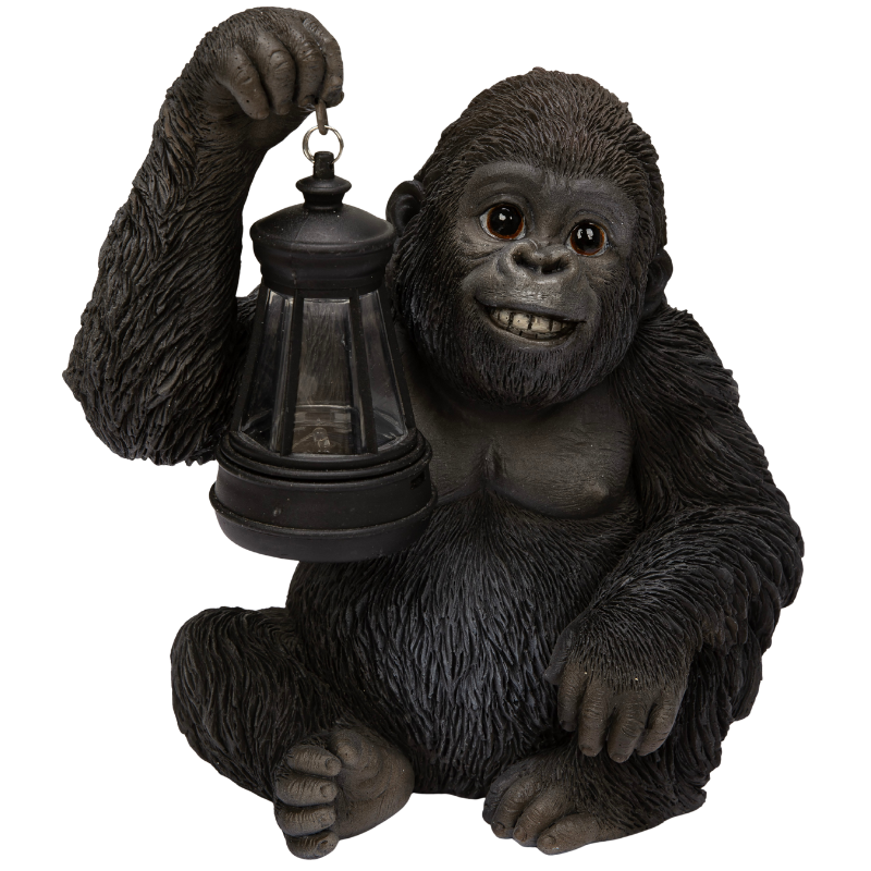 ソーラーランプを 右手で持ち上げる ゴリラ